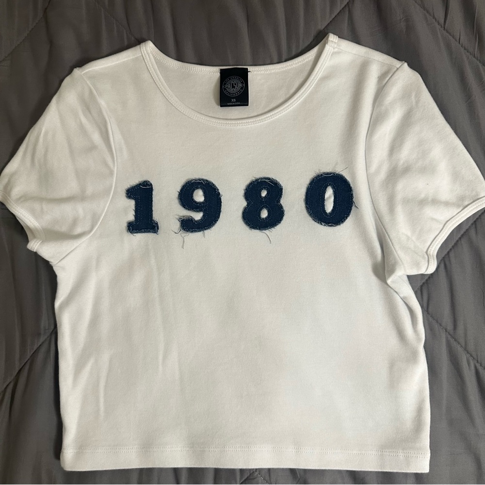 PacSun White Crop Top with Blue 1980 Design